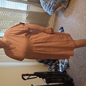 Knee length Peach and pinkish summer drees. Dress it up or make it casual.